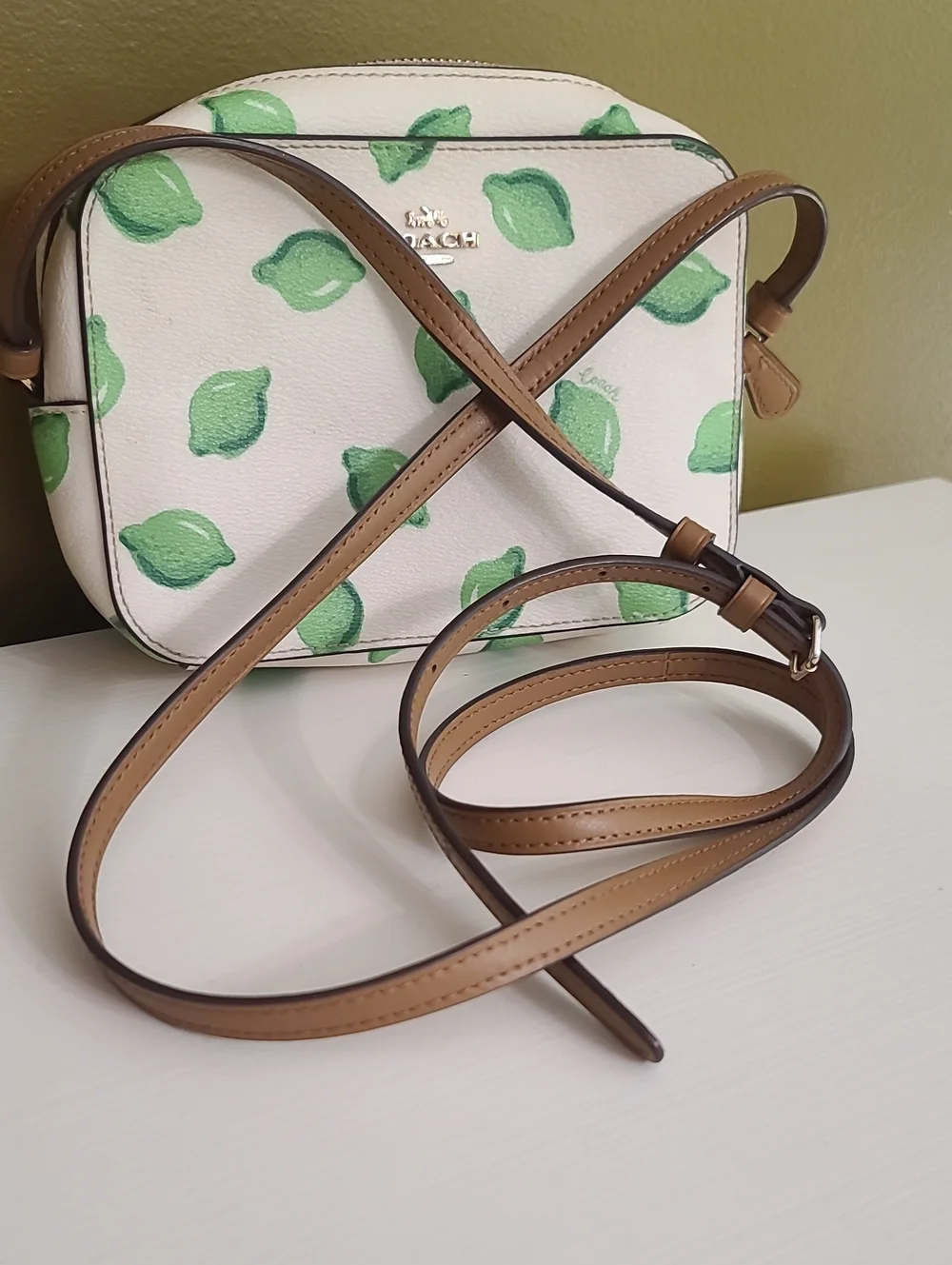 Coach White Crossbody with Green Lemon Motif and Tan Strap